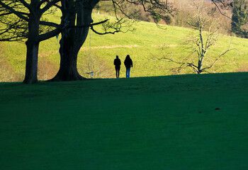 Two student walk in Stanmer park