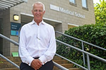 prof malcolm reed in front of the medical teaching building at bsms on the university of sussex campus