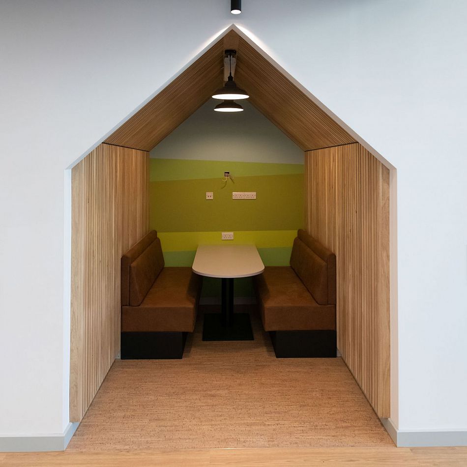 A close up of one of the work spaces in the student centre which is in the shape of a beach hut