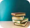 A photo of a stack of books on a blue background