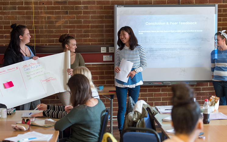A group of students present in class A group of students present in class