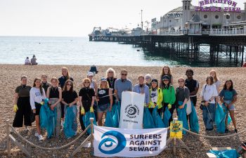 Group image on Brighton Beach of beach cleaners