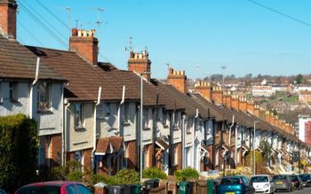 Row of terrace houses on a sunny day