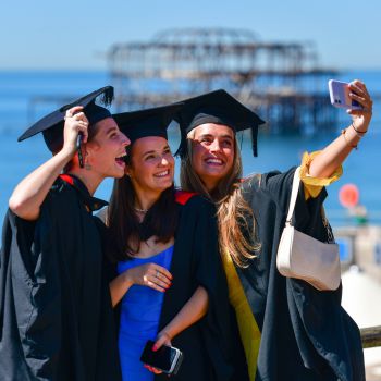 2022 graduation selfie with West Pier