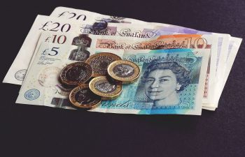 Coins and notes - photo by Suzy Hazelwood, via Pexels