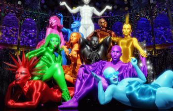 11 people, each a different rainbow colour pose in a group