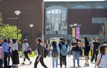 Students walking through Library Square