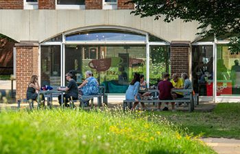 People sitting outside Sussex cafe