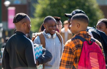 Students chatting together on campus