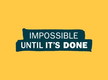 Graphic: Yellow background with navy blue ribbon in the centre displaying white text. Text reads: IMPOSSIBLE UNTIL IT'S DONE