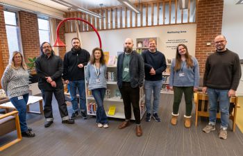 Photograph of eight members of the Library Student Experience team