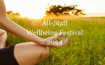 A person in a meditative pose, with their fingers touching, against an outdoor backdrop. Overlaying the image is the text “All-Staff Wellbeing Festival 2024