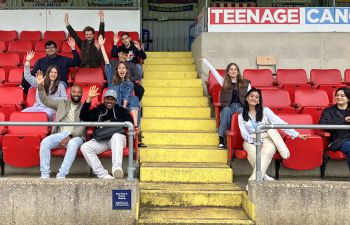 Economics students on the stands at the Lewes Football Club