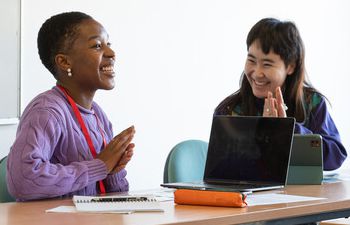 Two students in a language seminar