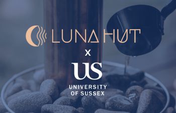 hot stones in the background with the lunahut logo over the top