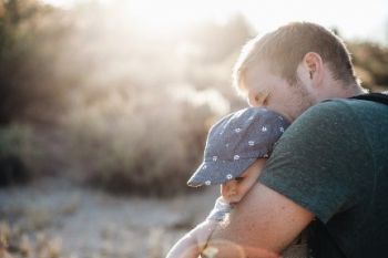 Father hugging a child