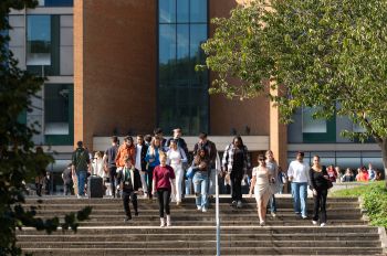 Students walking down steps in front of Jubilee building