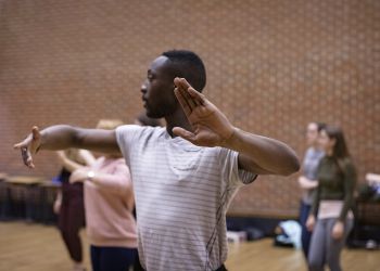 Ballroom dancers practicing their moves.