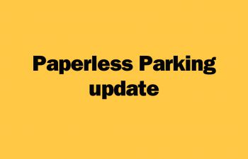 Yellow graphic with black font saying, paperless parking update