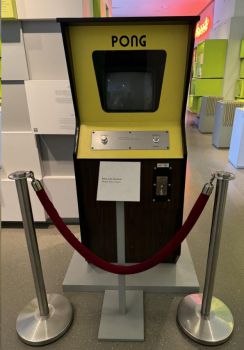 photo of a stand up games console with PONG written on it