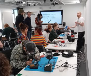 image of students soldering