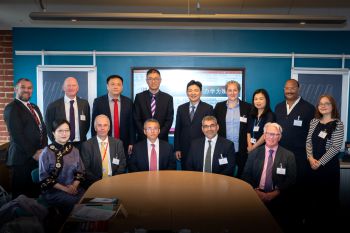 Visitors from Zhejiang Gongshang University are welcomed by members of staff from the University of Sussex