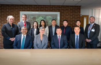 A group of visitors meeting the Vice Chancellor and other Sussex colleagues in Sussex House