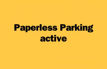 Yellow graphic with black font saying 'paperless parking active'