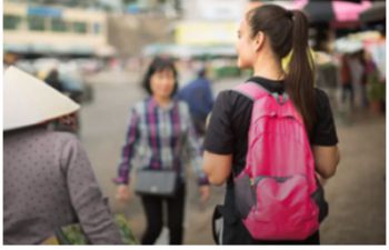 A person carrying a bag pack