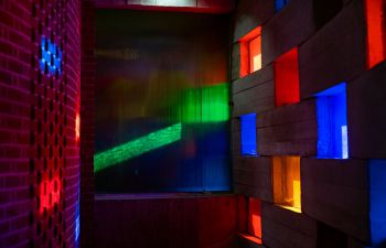 Photo of the colourful windows in the meeting house