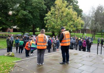 Staff standing outside Sussex House at their nearest assembly point