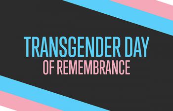 Transgender Day of Remembrance text written on a black, blue, pink and white background