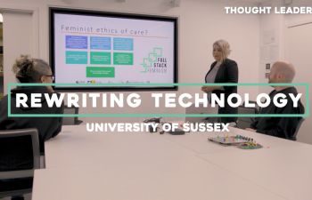 Screen opening title shot saying 'Rewriting Technology' University of Sussex