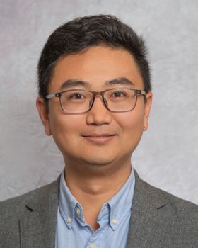 head shot of Dr Xiangming Tao