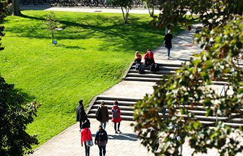 Photograph of students walking on University campus