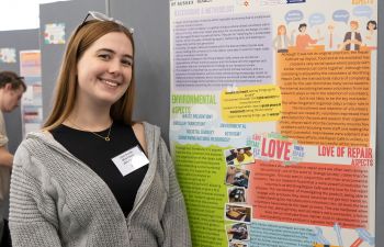 Picture of Jess Grubb with her research poster