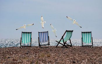 Deckchairs on a beach