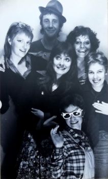 Black and white picture of The Devil’s Dyke band smiling at camera