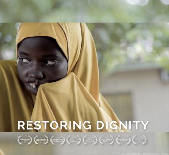 This is a film poster for Restoring Dignity: a journey with noma survivors. It shows one of the woman featured in the film