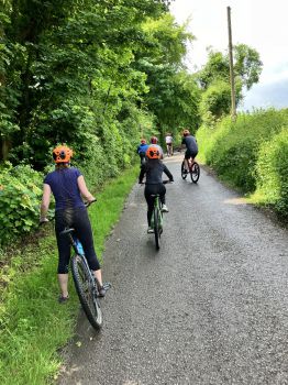 Staff cycling around campus