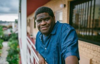 Gary Younge on a balcony