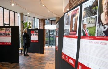 View of the exhibition display at Attenborough Centre with person in background