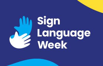 Sign Language Week logo with white and blue graphic hands on a dark blue background