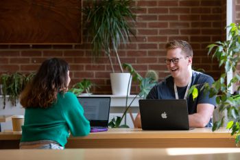 Postgraduate students in the library