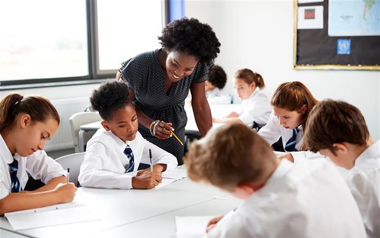 Teacher with primary school age pupils