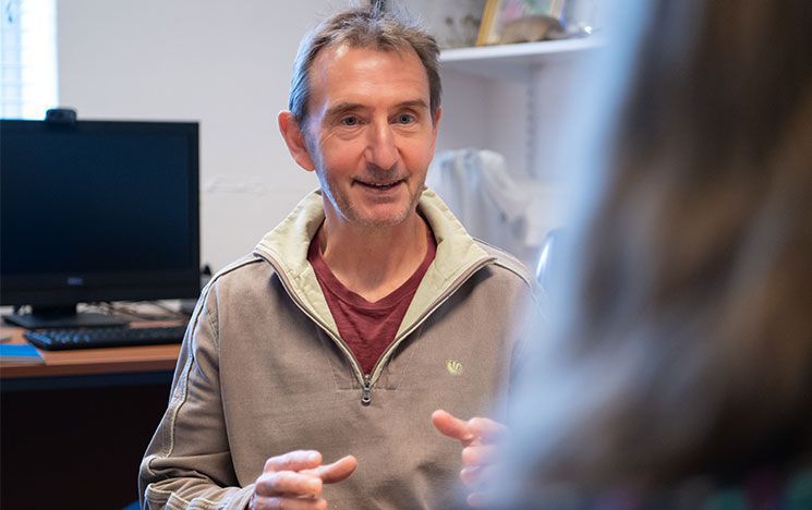 Professor Dave Goulson in conversation with a member of staff at the University of Sussex