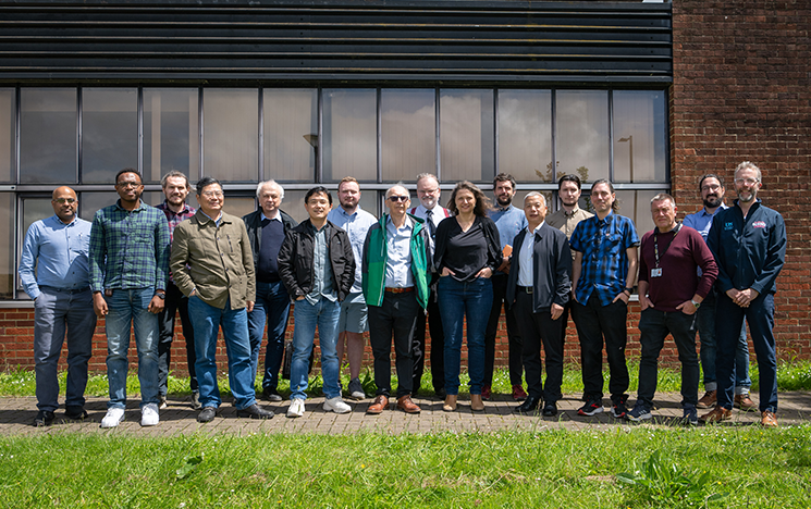 Members of the EMERC standing outside a building