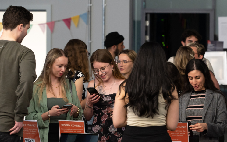 Students signing up to Sussex Connect through the Sussex Connect QR code.