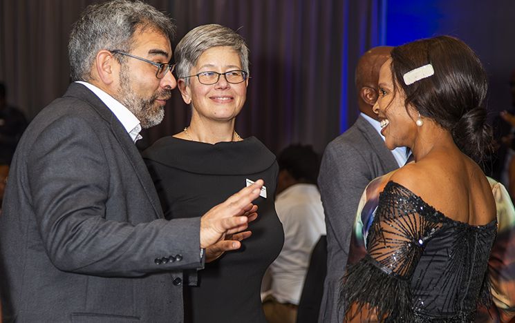 Professors Robin Banerjee and Sasha Roseneil with guests at the Vice-Chancellor’s Reception in Johannesburg.
