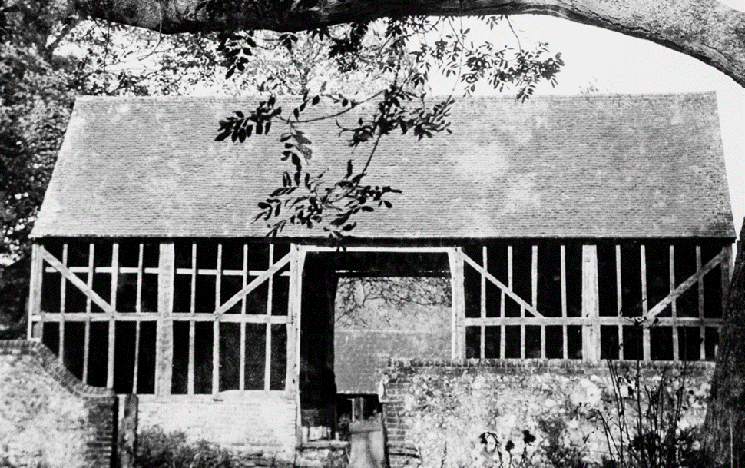 black and white archive photo of the old flint-faced barn on Forty Acre Tenant Laine